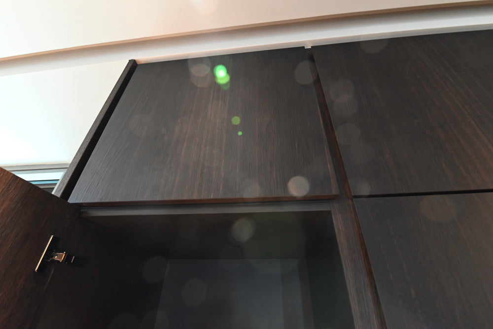 minotticucine Modern Classic Dark Brown Kitchen with Stone Countertops and Gaggenau Refrigerators