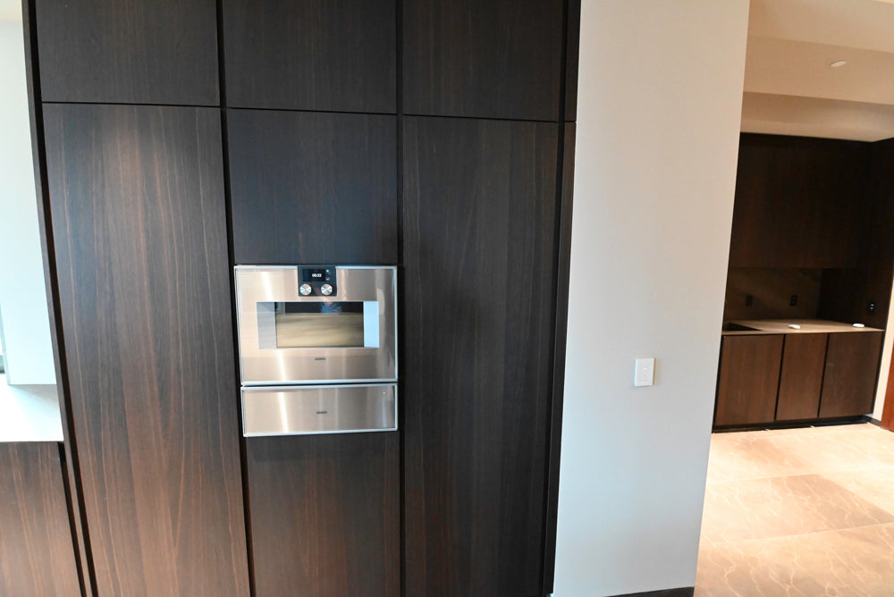 minotticucine Modern Classic Dark Brown Kitchen with Stone Countertops and Gaggenau Refrigerators