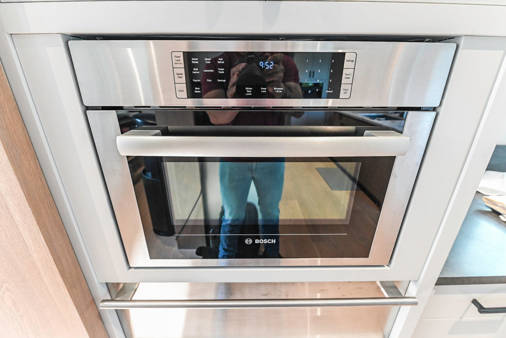 Custom Modern Two-Tone Kitchen with Marble Top Island and Sub-Zero & Wolf Appliances