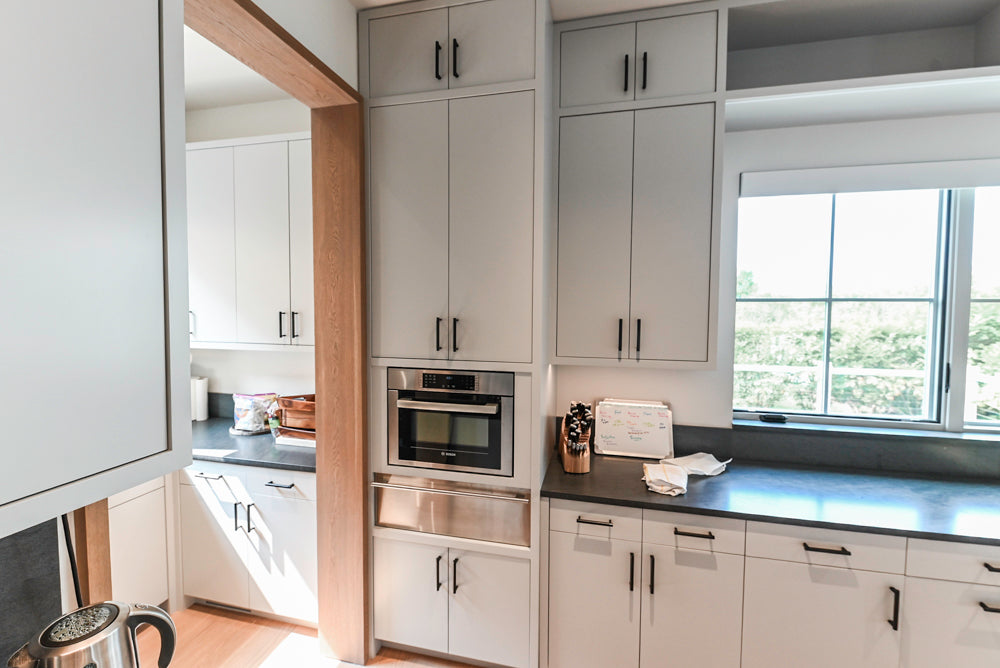 Custom Modern Two-Tone Kitchen with Marble Top Island and Sub-Zero & Wolf Appliances