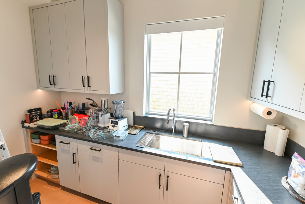 Custom Modern White Butler's Pantry with Stone Countertops & Sink