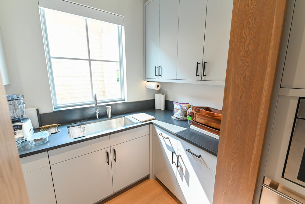 Custom Modern White Butler's Pantry with Stone Countertops & Sink