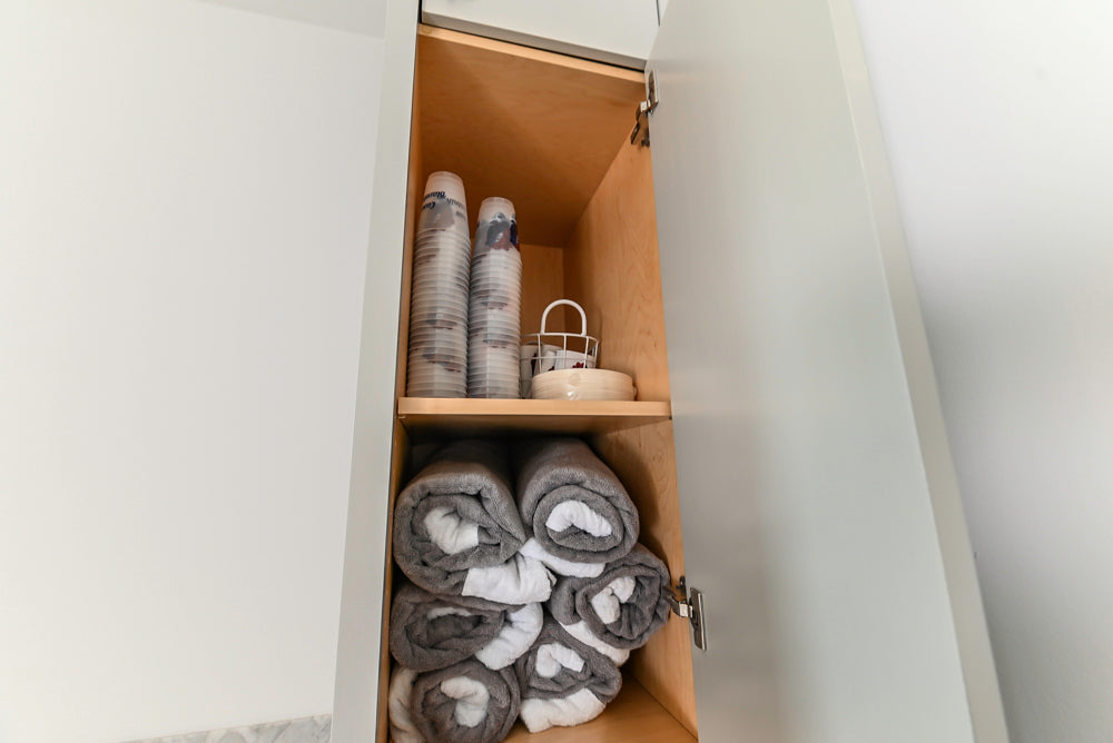 Custom Modern Light Grey Pantry with White Stone Countertops and Stainless Steel Sink