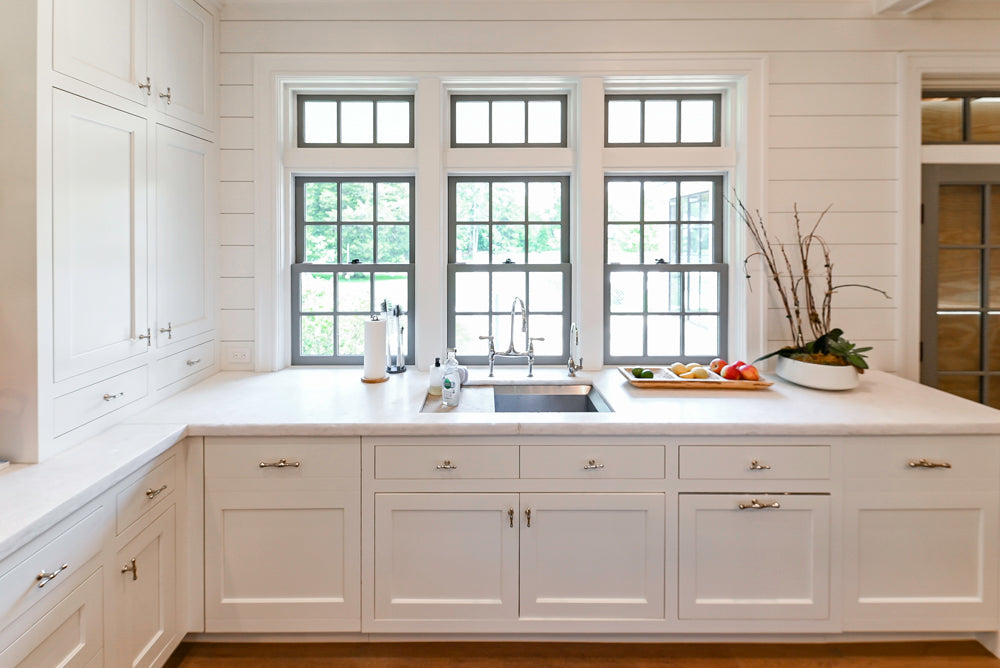 Ciuffo Cabinetry Transitional White Kitchen with Marble Countertops and Thermador Appliances