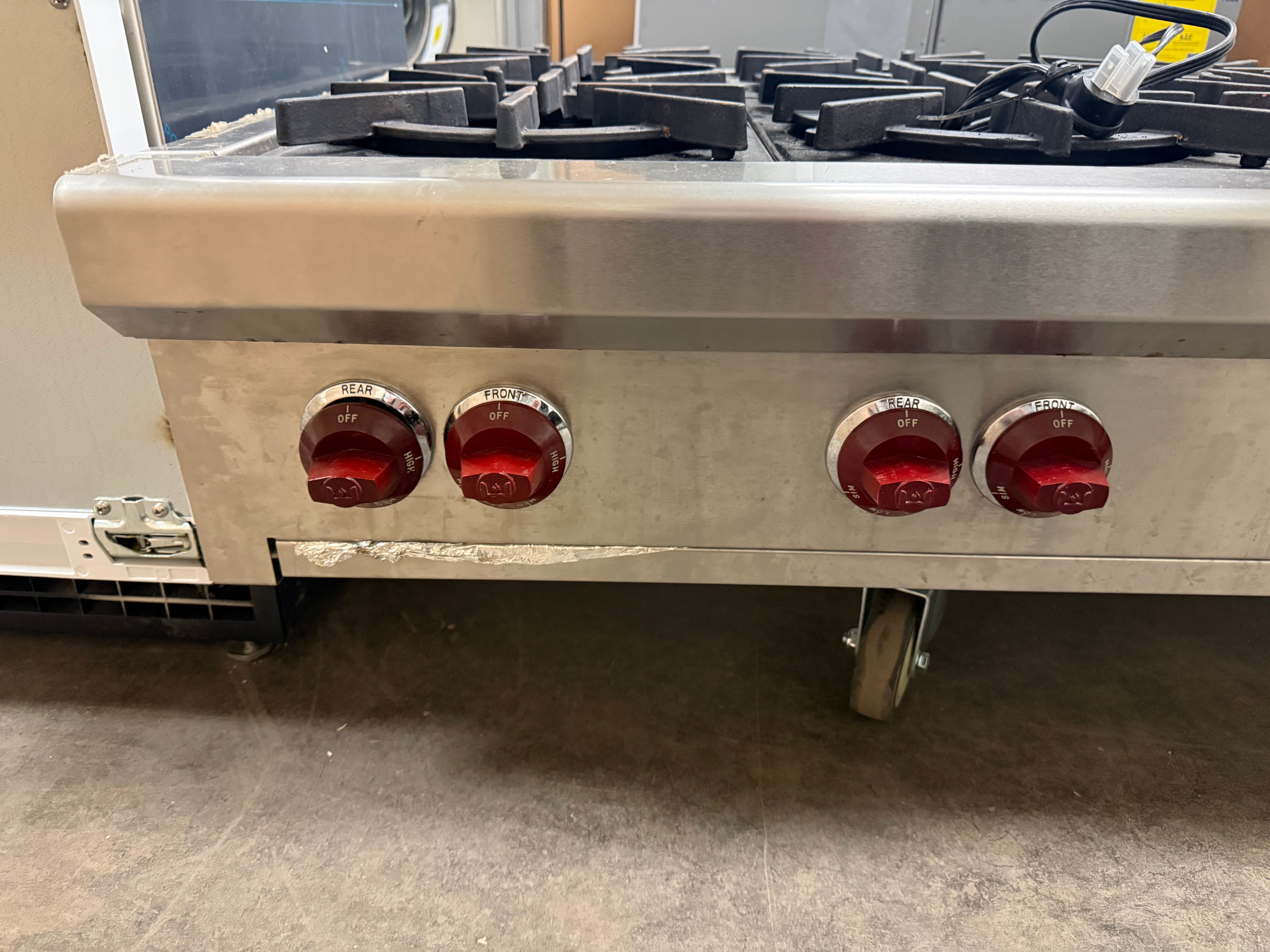 High-end stainless steel Wolf RT488 cooktop with continuous cast iron grates