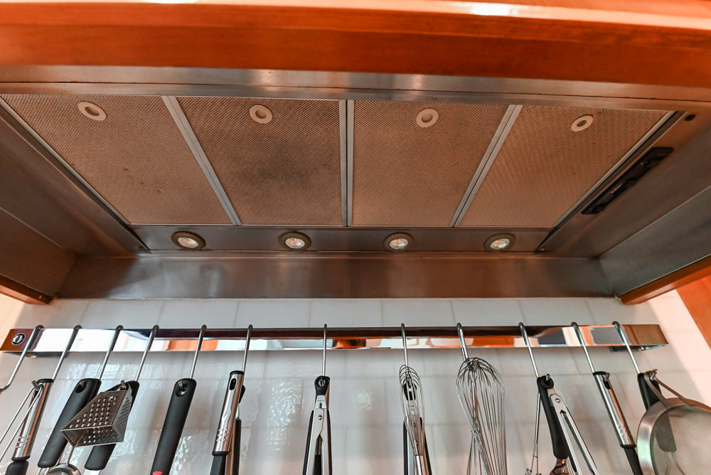 Custom Traditional Natural Wood Kitchen with Granite Countertops and Appliances