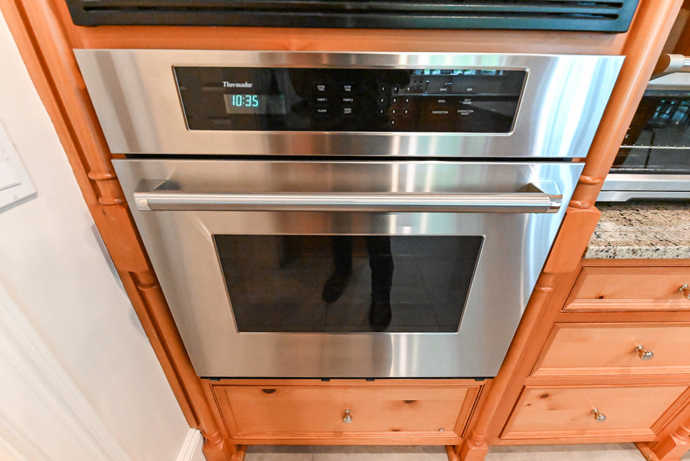 Custom Traditional Natural Wood Kitchen with Granite Countertops and Appliances