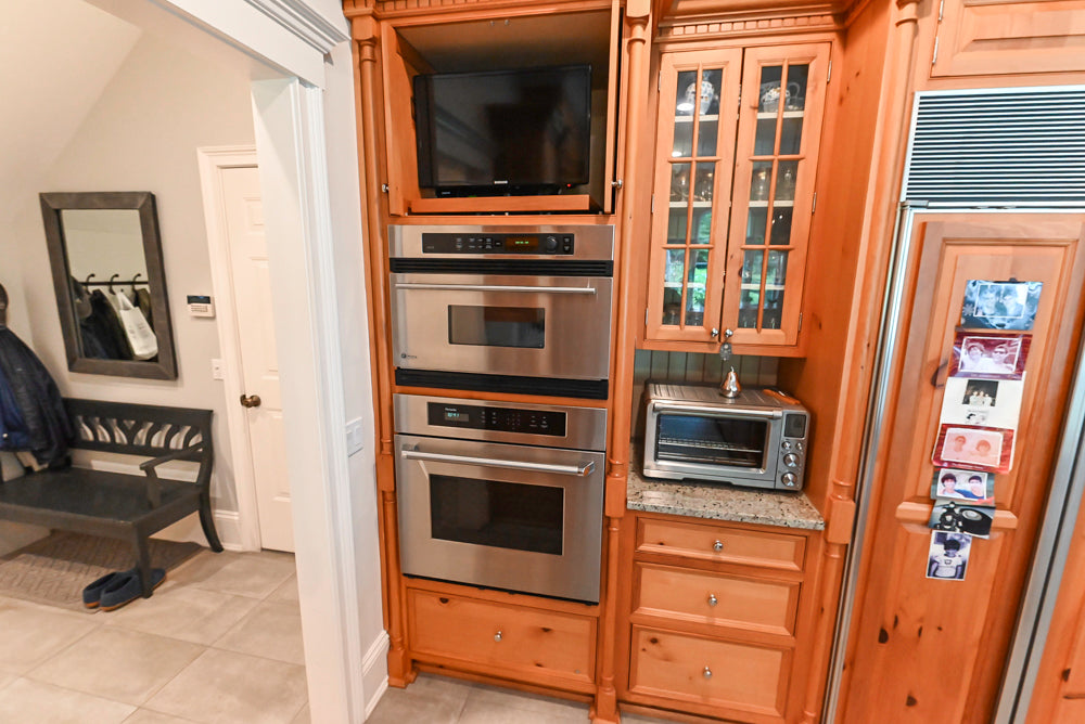 Custom Traditional Natural Wood Kitchen with Granite Countertops and Appliances