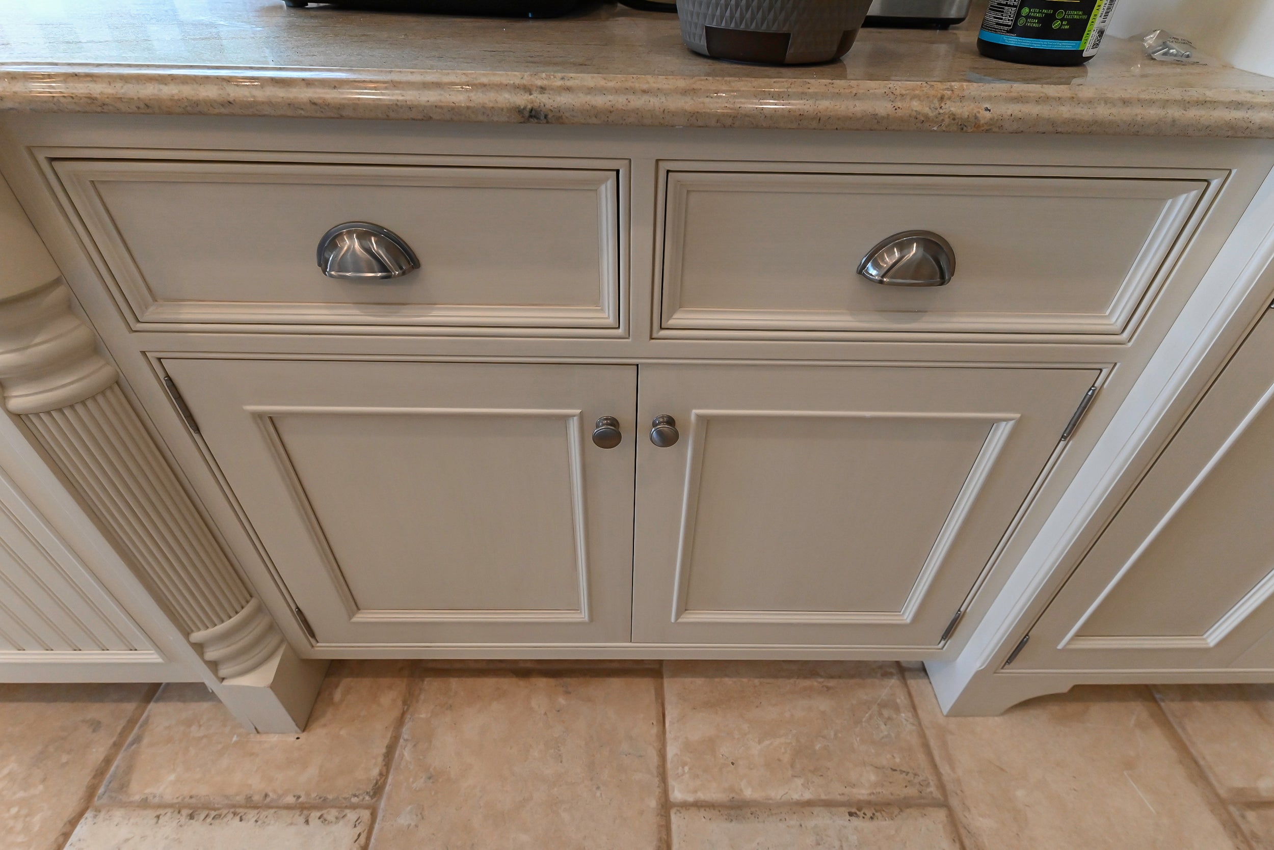 Craftmaid Traditional Off White Kitchen with Island, Granite Countertops & 48" Sub-Zero Refrigerator