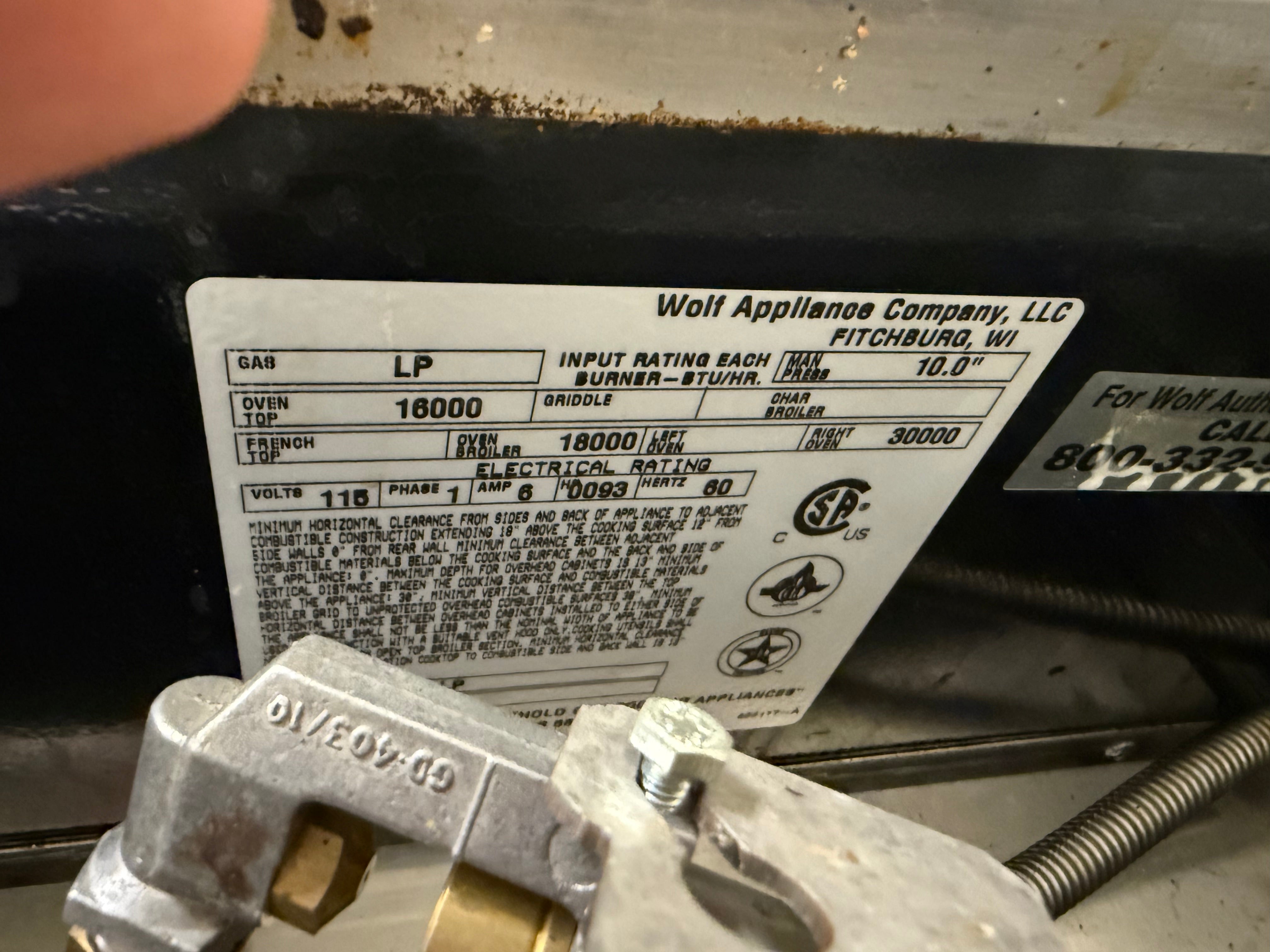 Technical label on a appliance with visible branding and specifications.