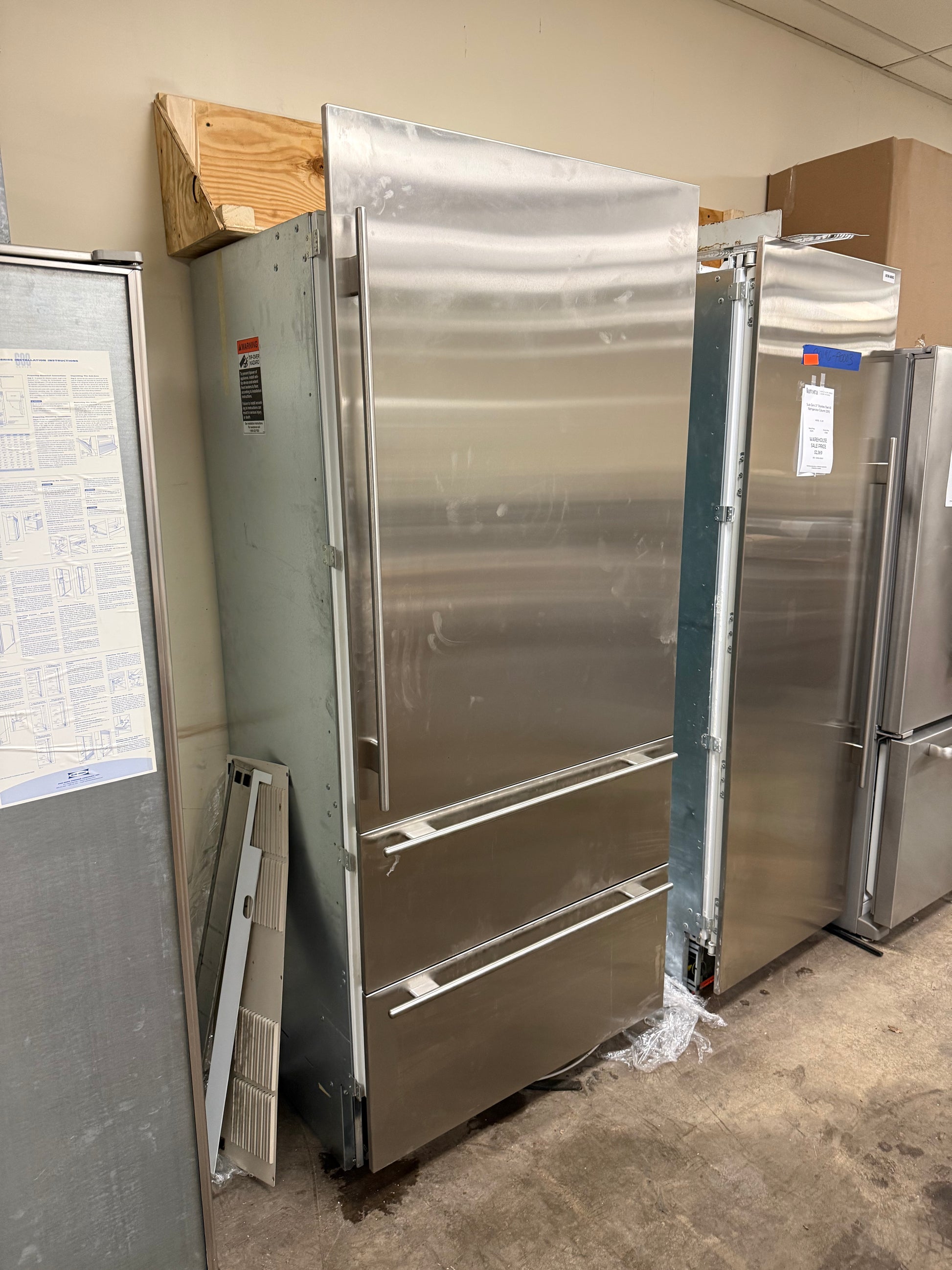 High-end stainless steel bottom freezer refrigerator by Sub-Zero with dual cooling