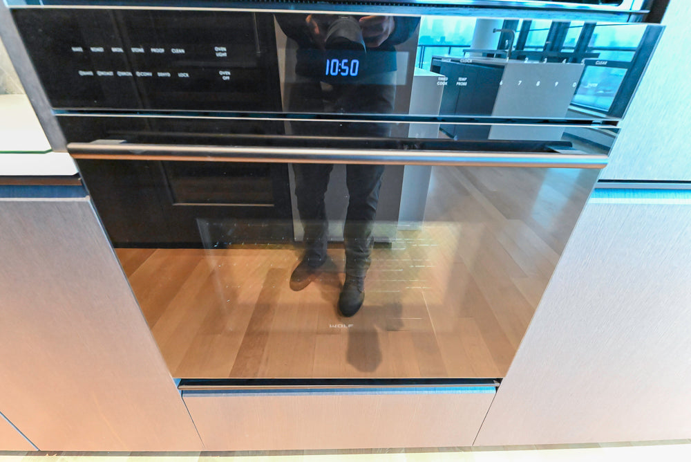 Custom Modern Wood Veneer Kitchen with White Marble Countertops and Wolf & Miele Appliances