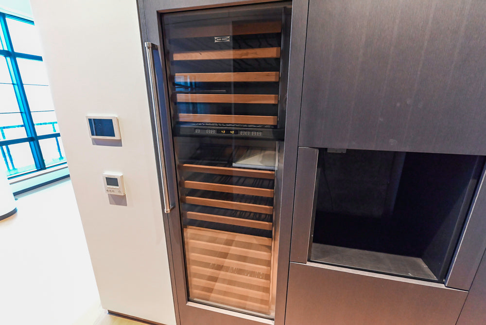 Custom Modern Wood Veneer Kitchen with White Marble Countertops and Wolf & Miele Appliances