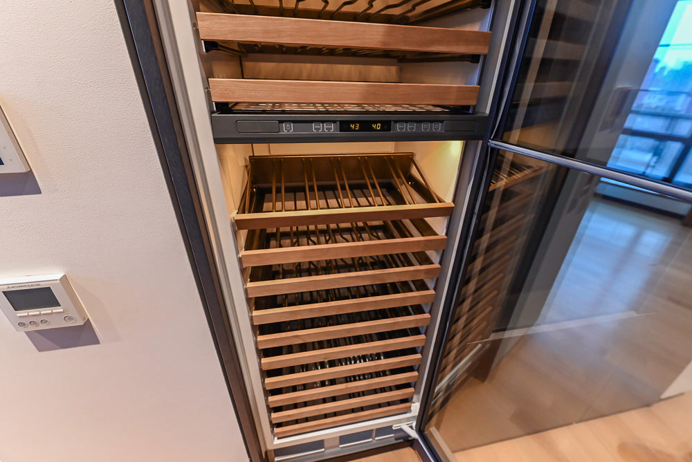 Custom Modern Wood Veneer Kitchen with White Marble Countertops and Wolf & Miele Appliances