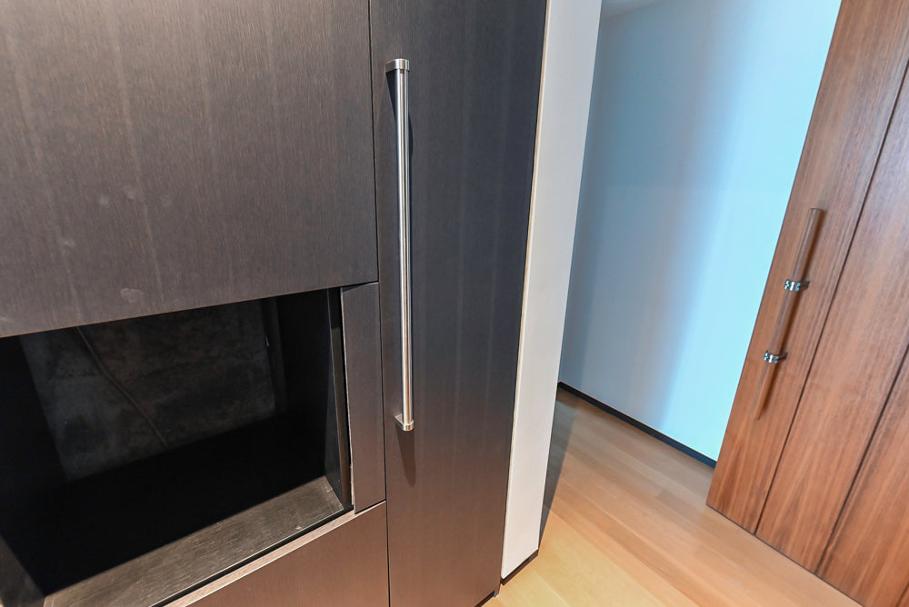 Custom Modern Wood Veneer Kitchen with White Marble Countertops and Wolf & Miele Appliances