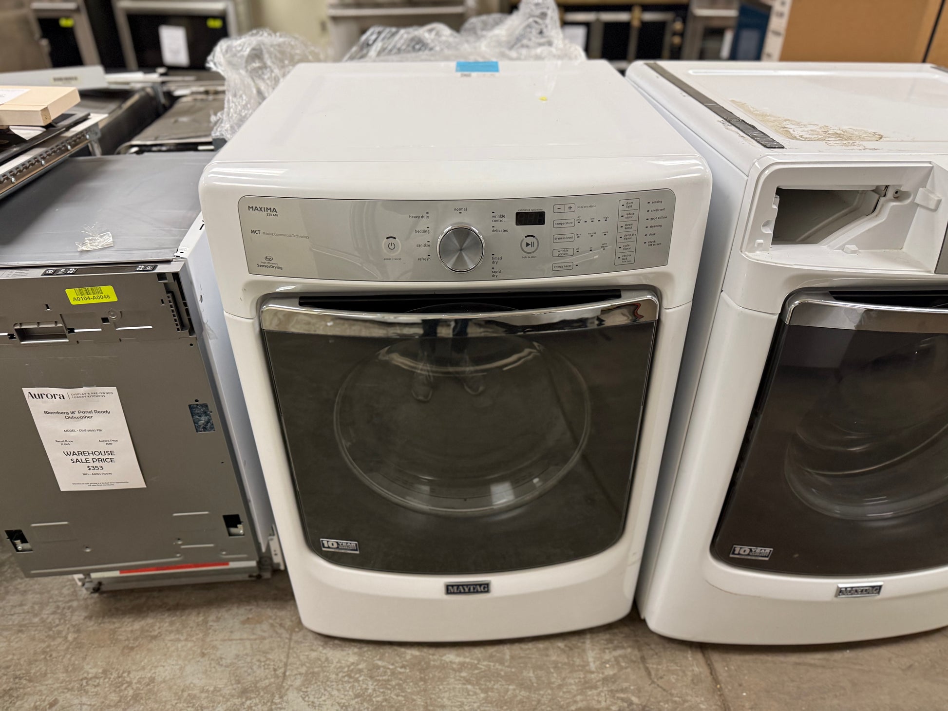 White washer and dryer set in a showroom setting