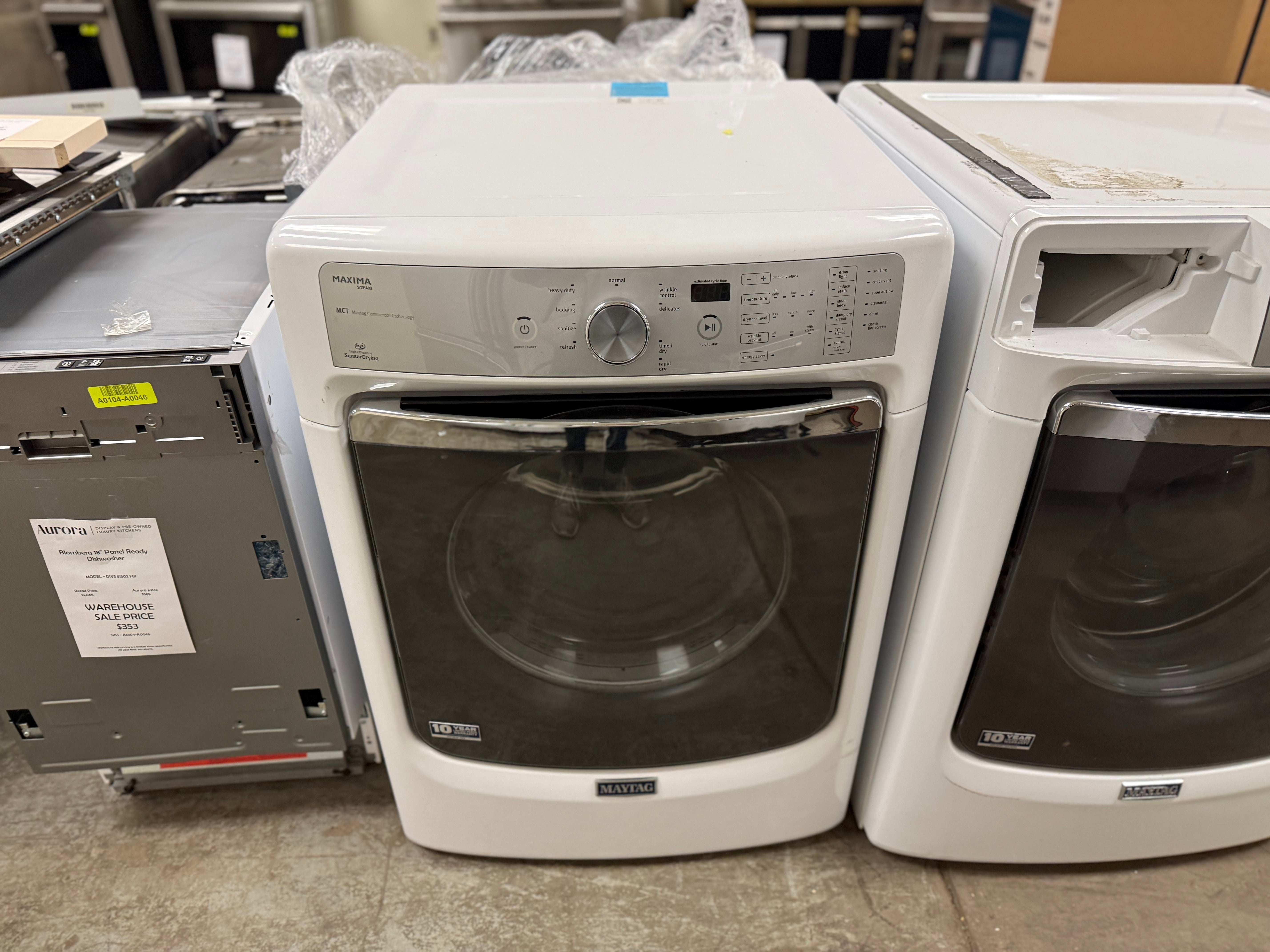White washer and dryer set in a showroom setting