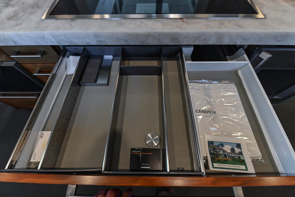 Custom Modern Tigerwood Kitchen with Marble Countertops and Gaggenau Appliances