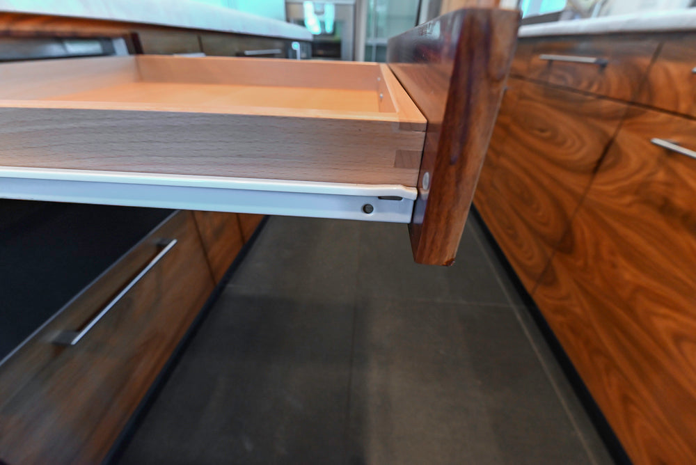 Custom Modern Tigerwood Kitchen with Marble Countertops and Gaggenau Appliances