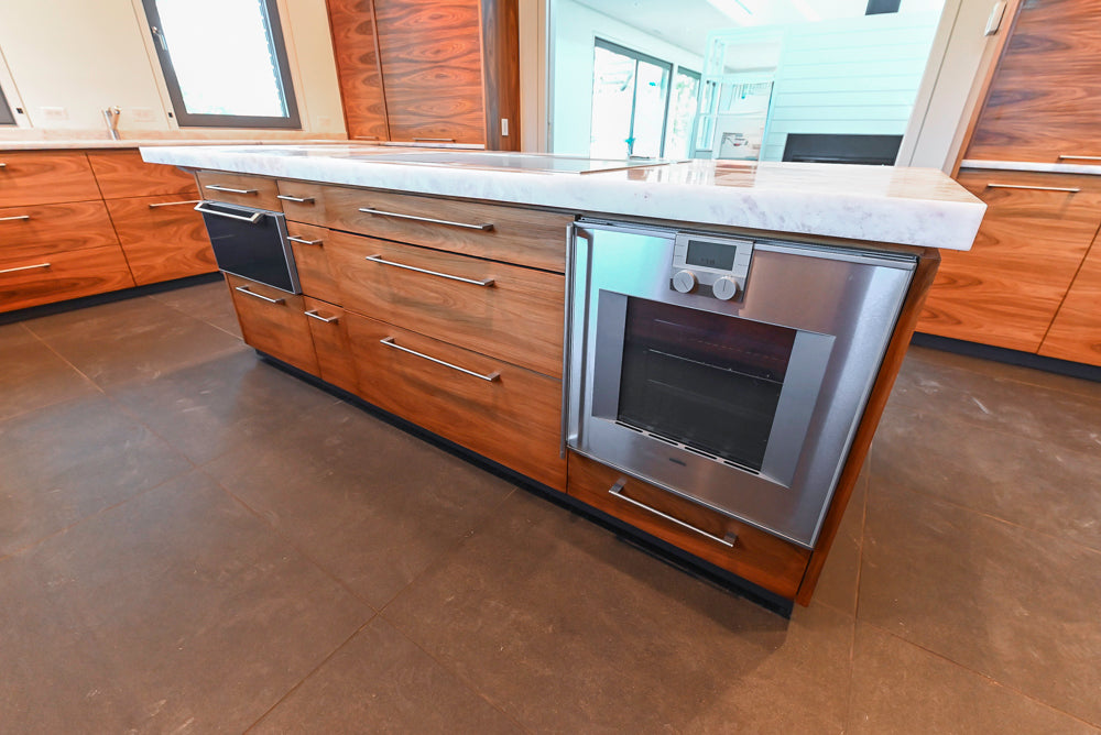 Custom Modern Tigerwood Kitchen with Marble Countertops and Gaggenau Appliances