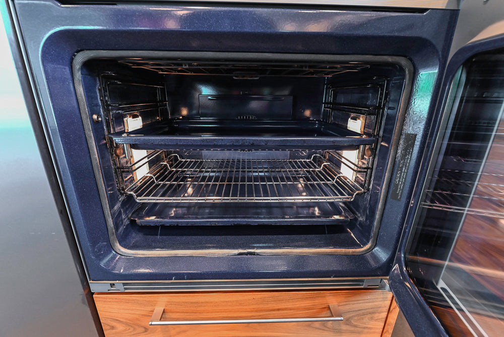 Custom Modern Tigerwood Kitchen with Marble Countertops and Gaggenau Appliances