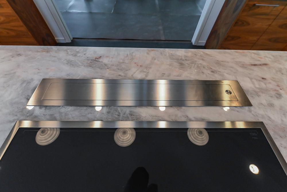 Custom Modern Tigerwood Kitchen with Marble Countertops and Gaggenau Appliances