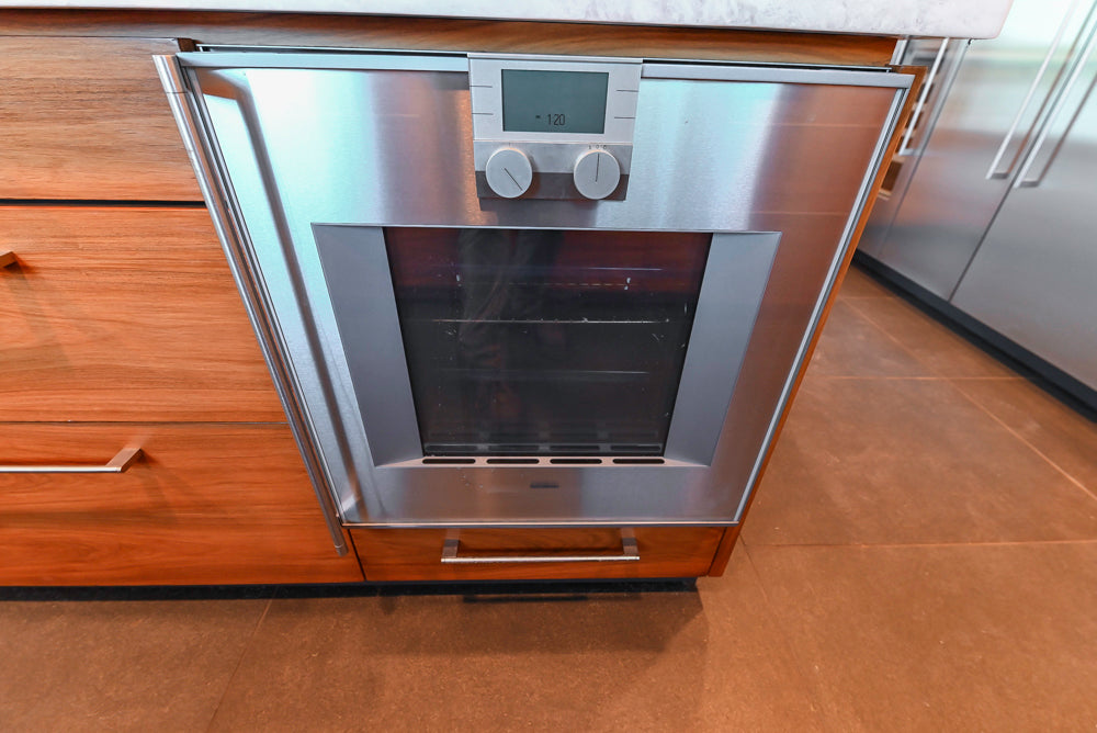 Custom Modern Tigerwood Kitchen with Marble Countertops and Gaggenau Appliances