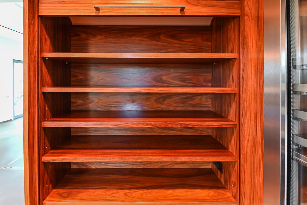 Custom Modern Tigerwood Kitchen with Marble Countertops and Gaggenau Appliances