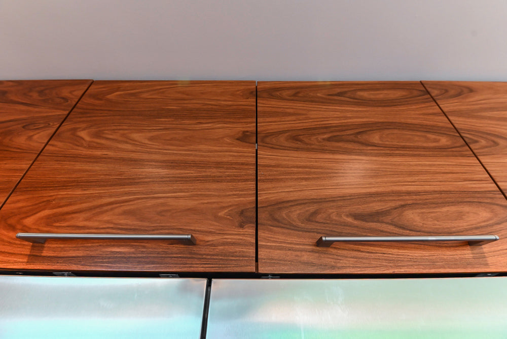 Custom Modern Tigerwood Kitchen with Marble Countertops and Gaggenau Appliances