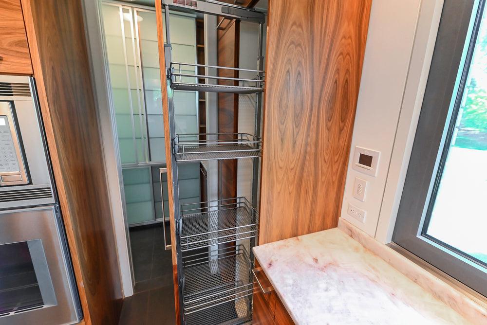 Custom Modern Tigerwood Kitchen with Marble Countertops and Gaggenau Appliances