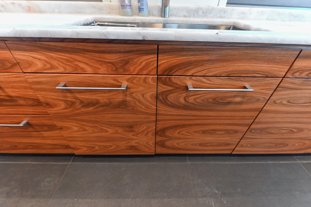 Custom Modern Tigerwood Kitchen with Marble Countertops and Gaggenau Appliances