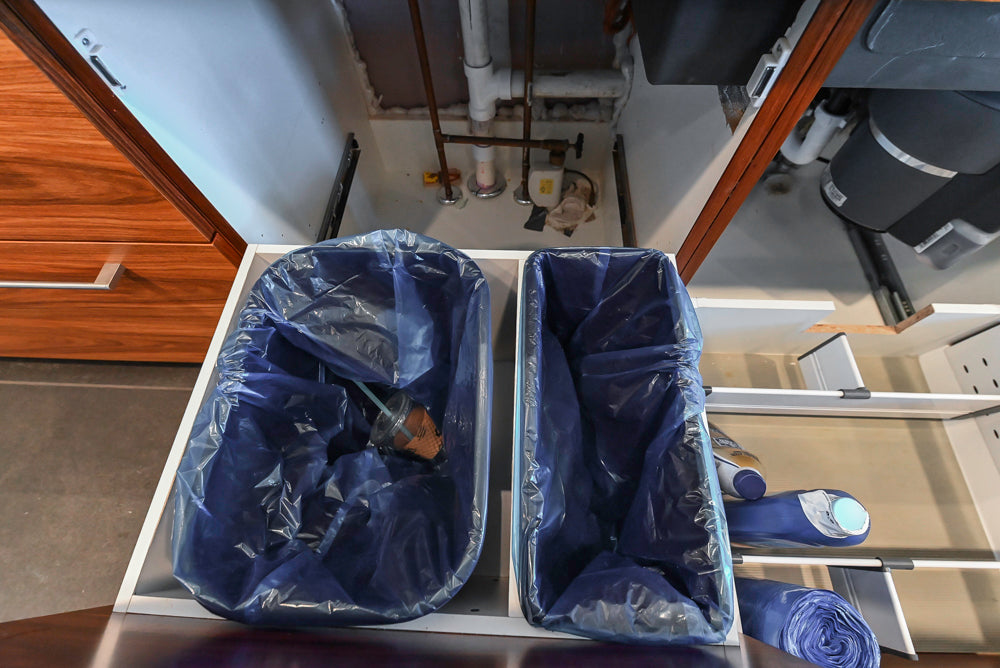 Custom Modern Tigerwood Kitchen with Marble Countertops and Gaggenau Appliances