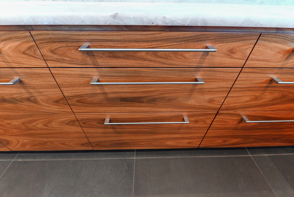 Custom Modern Tigerwood Kitchen with Marble Countertops and Gaggenau Appliances