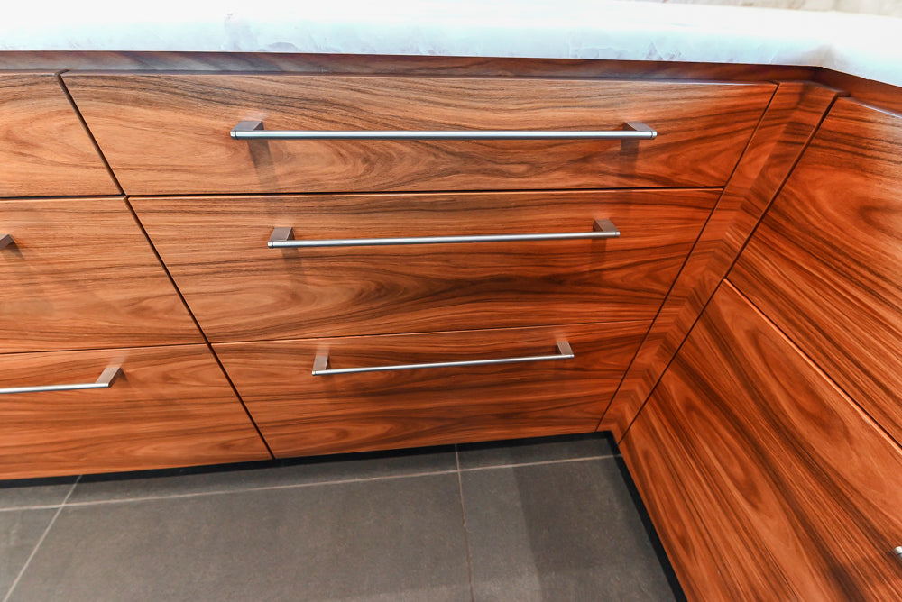 Custom Modern Tigerwood Kitchen with Marble Countertops and Gaggenau Appliances