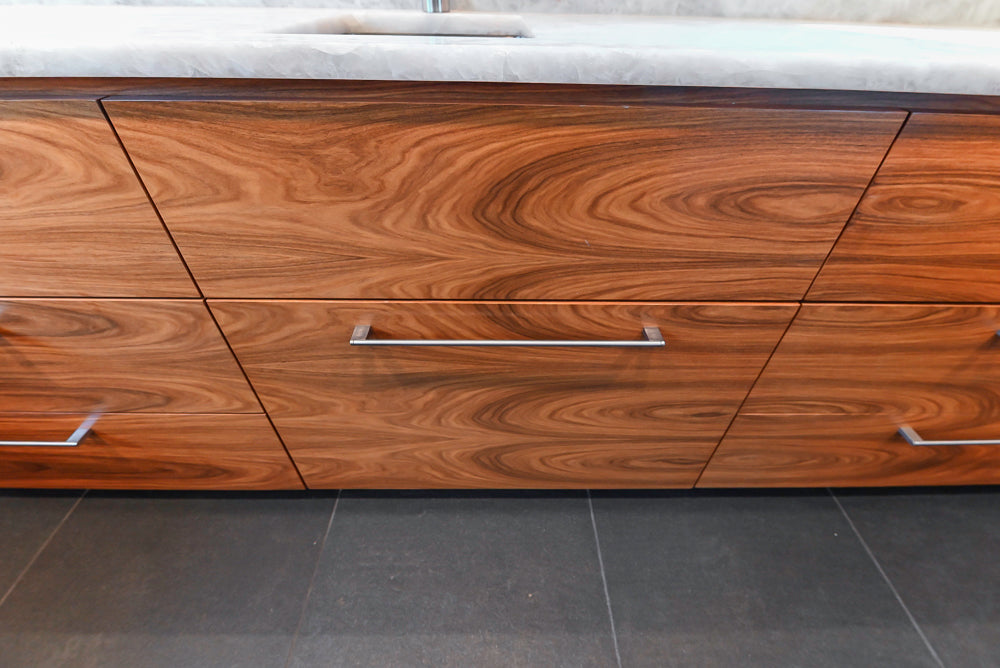 Custom Modern Tigerwood Kitchen with Marble Countertops and Gaggenau Appliances