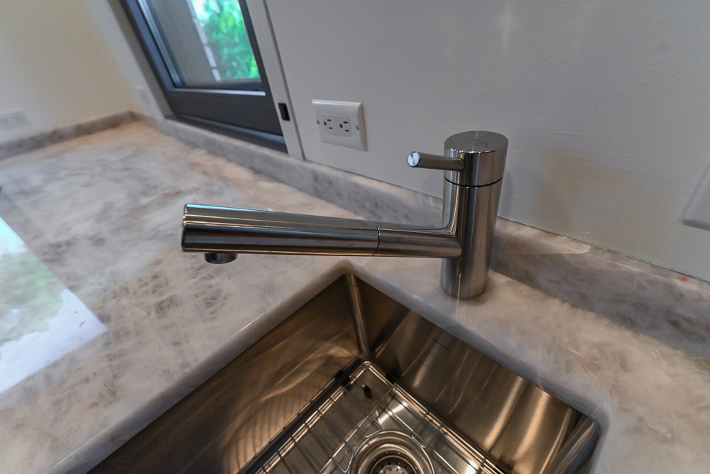Custom Modern Tigerwood Kitchen with Marble Countertops and Gaggenau Appliances