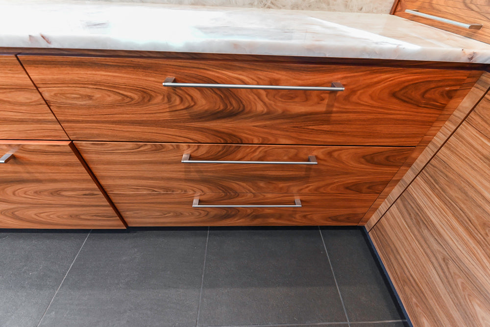 Custom Modern Tigerwood Kitchen with Marble Countertops and Gaggenau Appliances