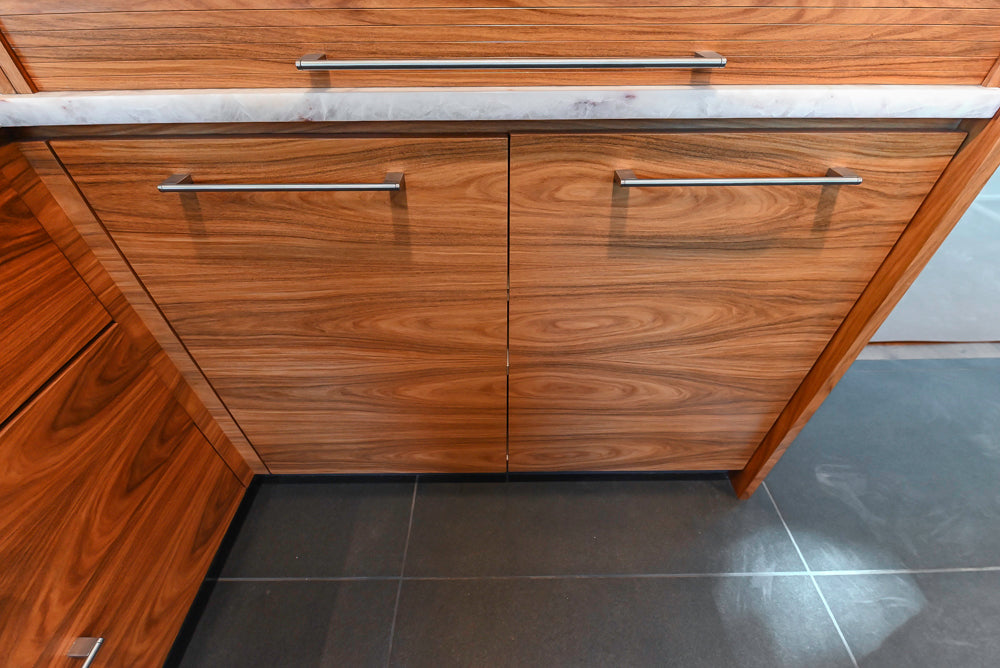 Custom Modern Tigerwood Kitchen with Marble Countertops and Gaggenau Appliances