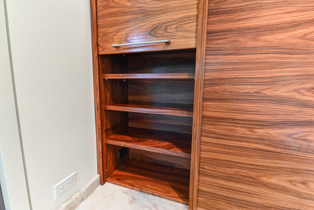 Custom Modern Tigerwood Kitchen with Marble Countertops and Gaggenau Appliances