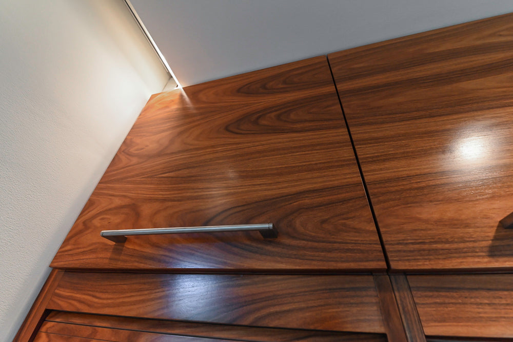 Custom Modern Tigerwood Kitchen with Marble Countertops and Gaggenau Appliances