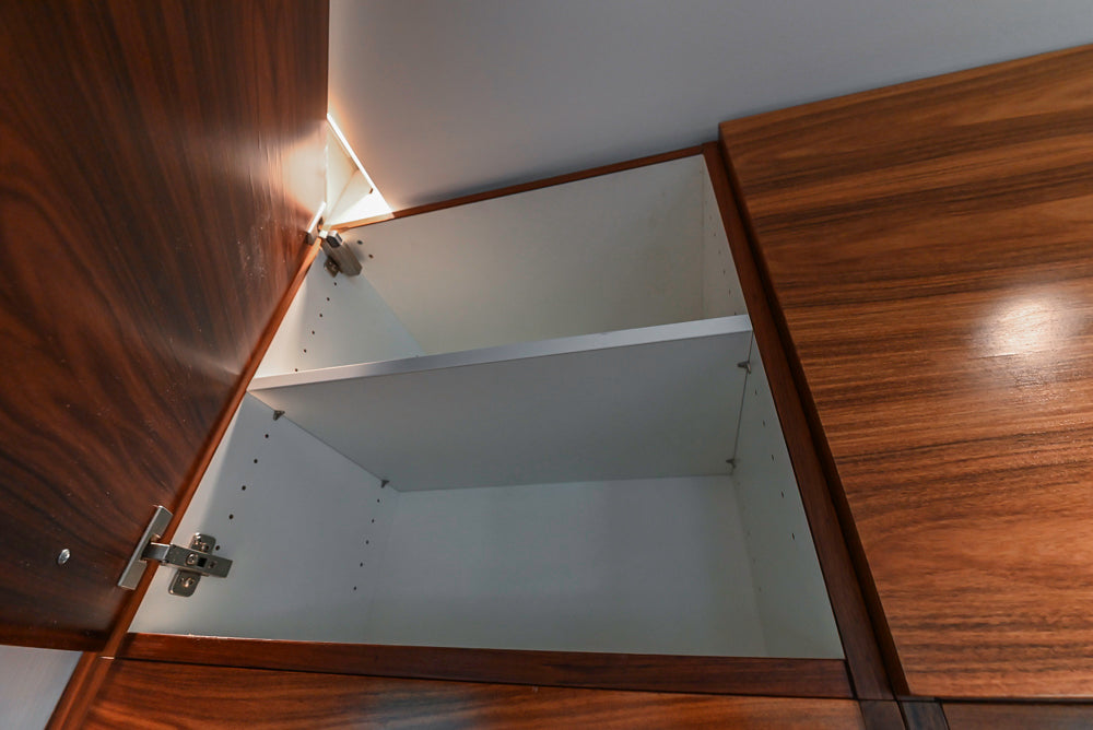 Custom Modern Tigerwood Kitchen with Marble Countertops and Gaggenau Appliances