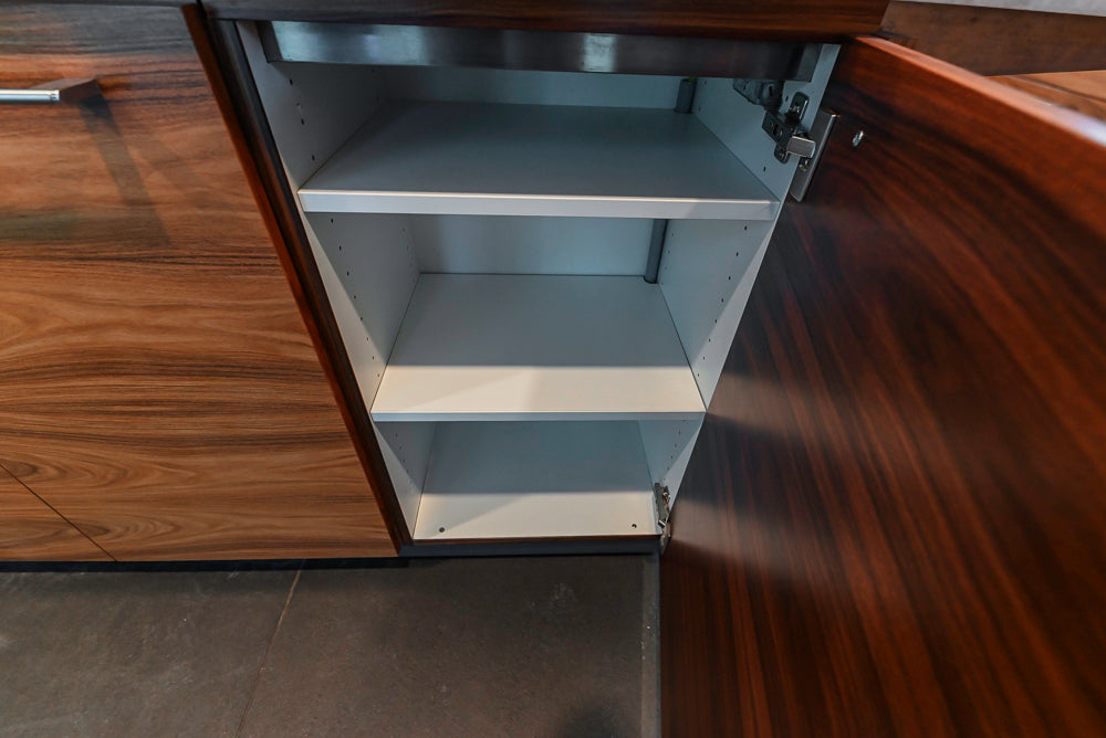 Custom Modern Tigerwood Kitchen with Marble Countertops and Gaggenau Appliances