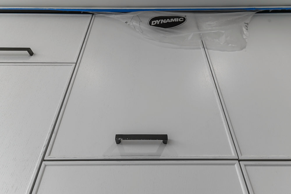 Custom Transitional White Kitchen with Island and Quartzite Countertops