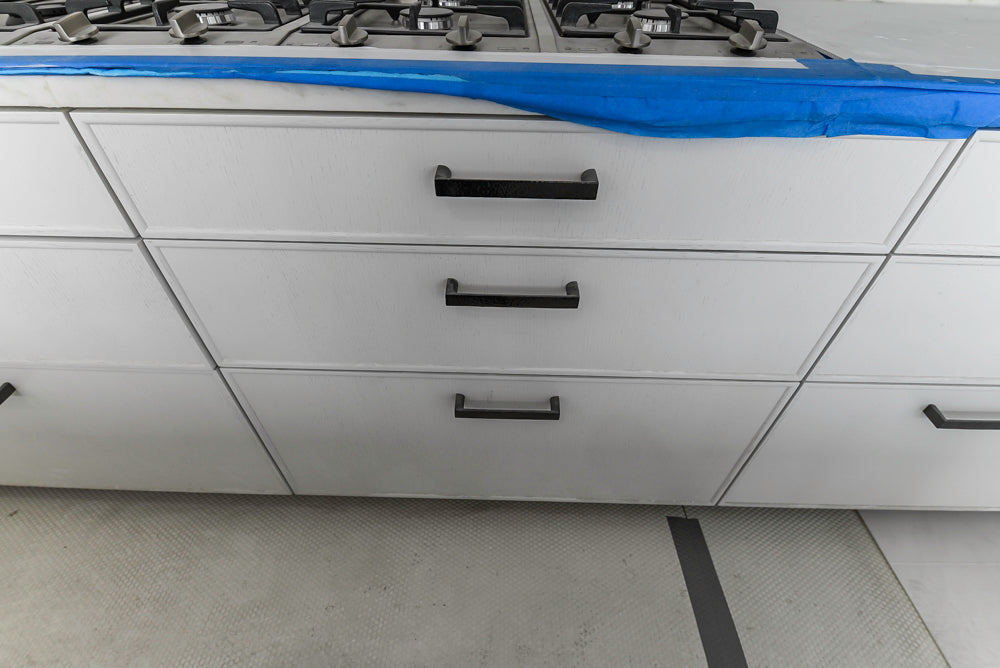 Custom Transitional White Kitchen with Island and Quartzite Countertops
