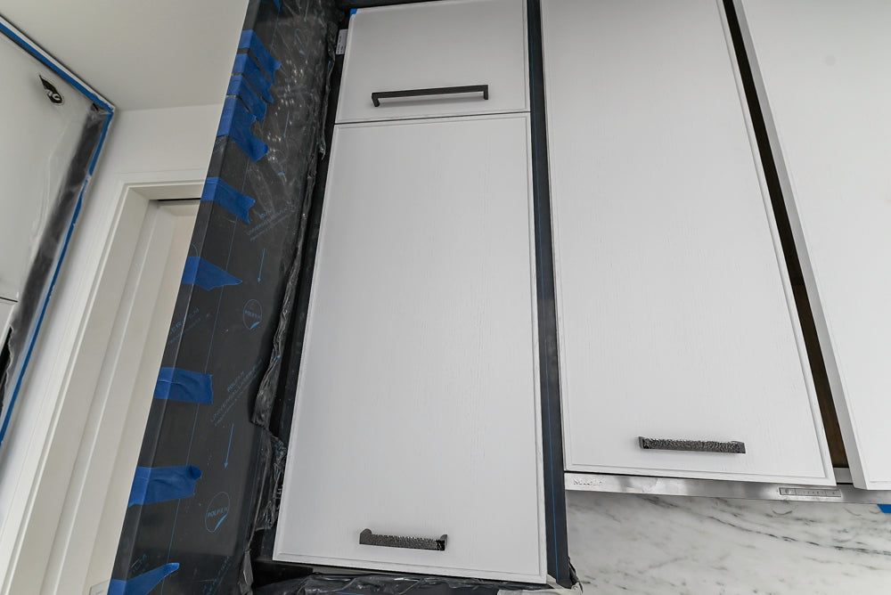 Custom Transitional White Kitchen with Island and Quartzite Countertops