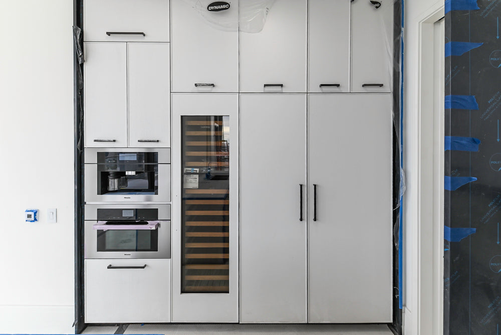 Custom Transitional White Kitchen with Island and Quartzite Countertops 