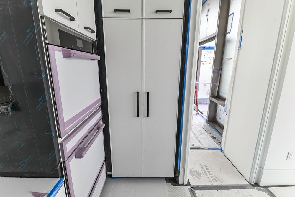 Custom Transitional White Kitchen with Island and Quartzite Countertops