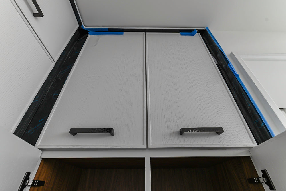 Custom Transitional White Kitchen with Island and Quartzite Countertops