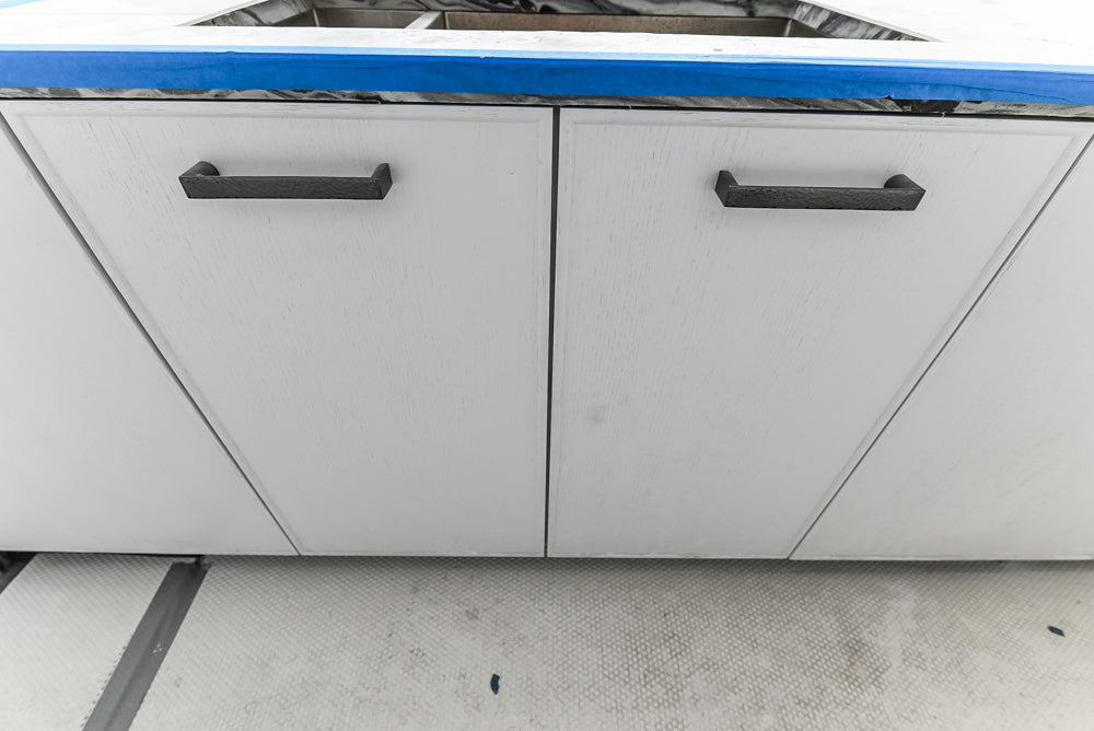 Custom Transitional White Kitchen with Island and Quartzite Countertops