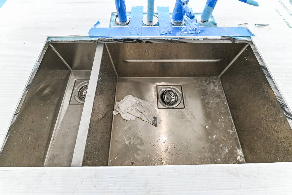 Custom Transitional White Kitchen with Island and Quartzite Countertops